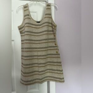 Vintage dotti sleeveless dress
With buttons on one side